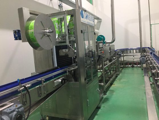 Thailand customer shrink sleeve applicator running