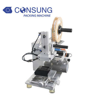 Tabletop semi automatic labeling machine for flat surfaces